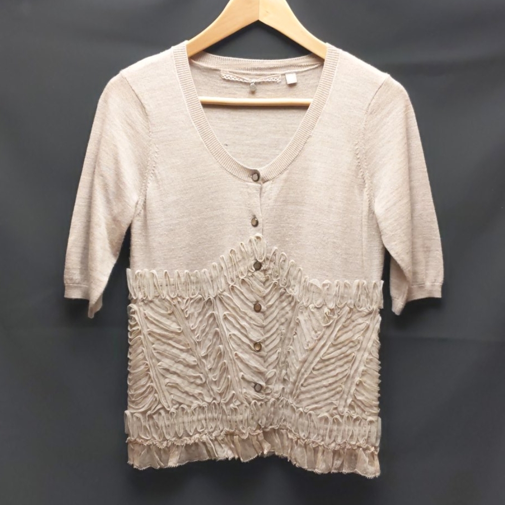 Knitted and knotted cardigan with ruffle detailing